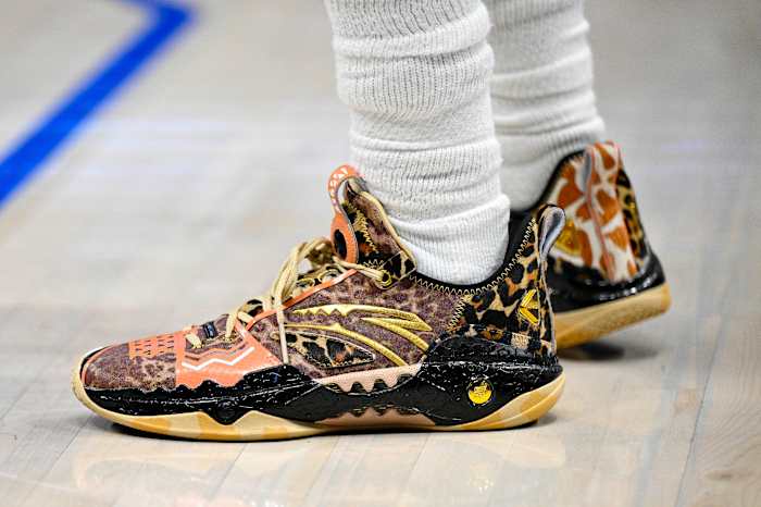 Dallas Mavericks guard Kyrie Irving's cheetah-print ANTA sneakers.